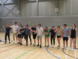 Badminton players celebrating after a match